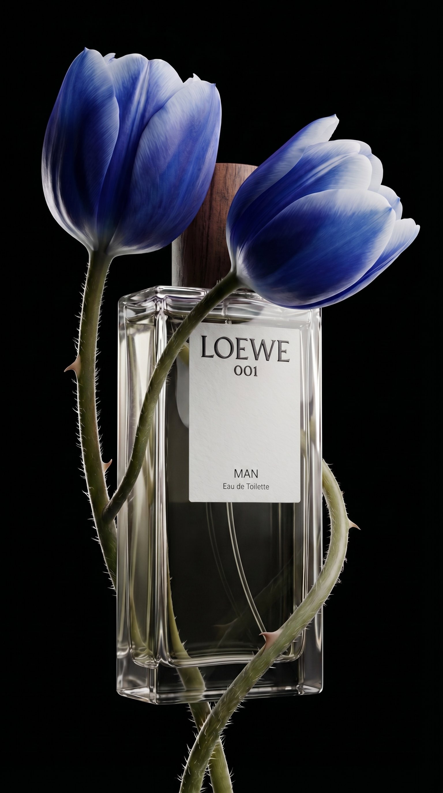 Loewe 001 Man bottle with two blue tulips and thorned stems